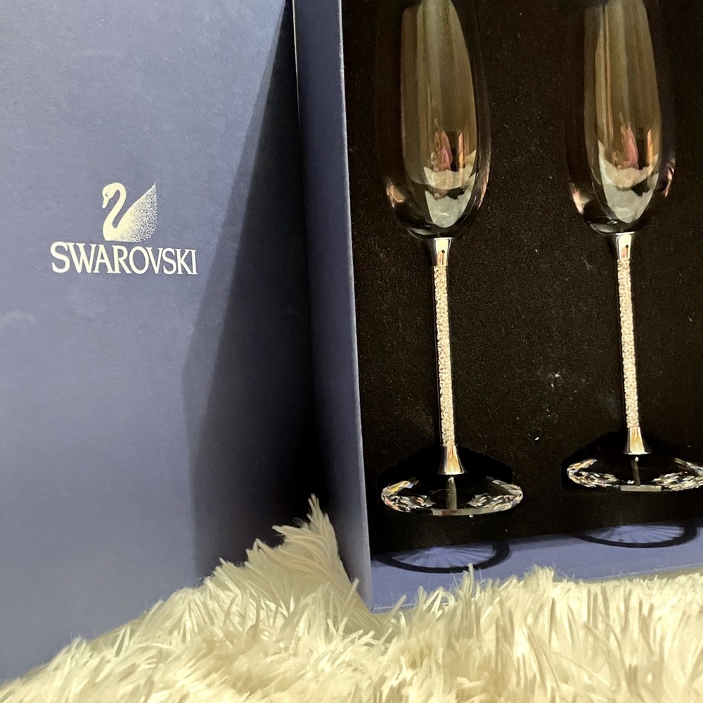 Set of two Swarovski 10 inch Champagne Flutes.